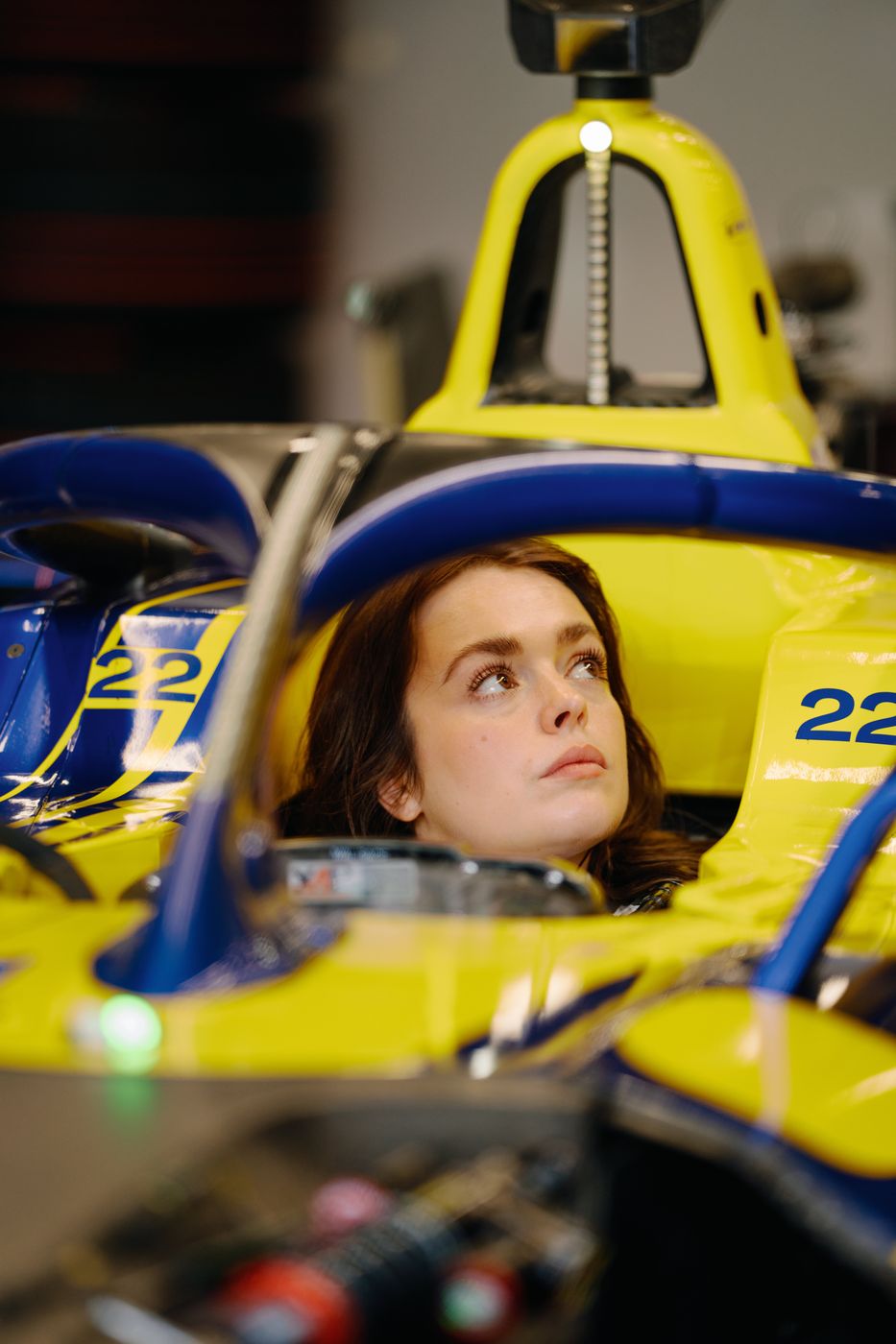 Creator seated in a Formula E car